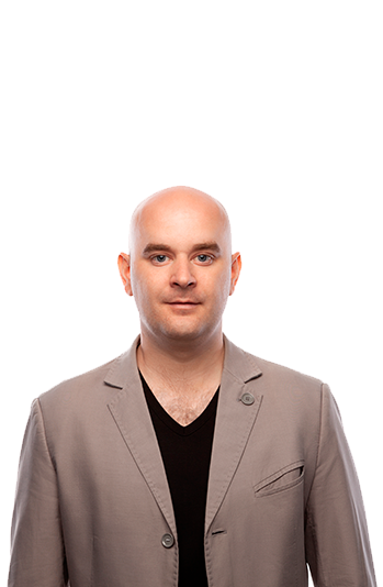 Attractive bald man in a beige jacket on a white b 2021 08 27 20 57 31 utc.png